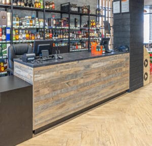 Liquor store counter with recycled wood look