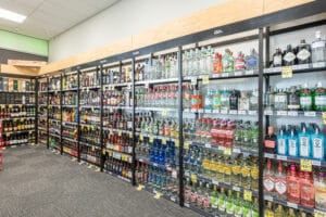 Liquor store wall shelving and category signage